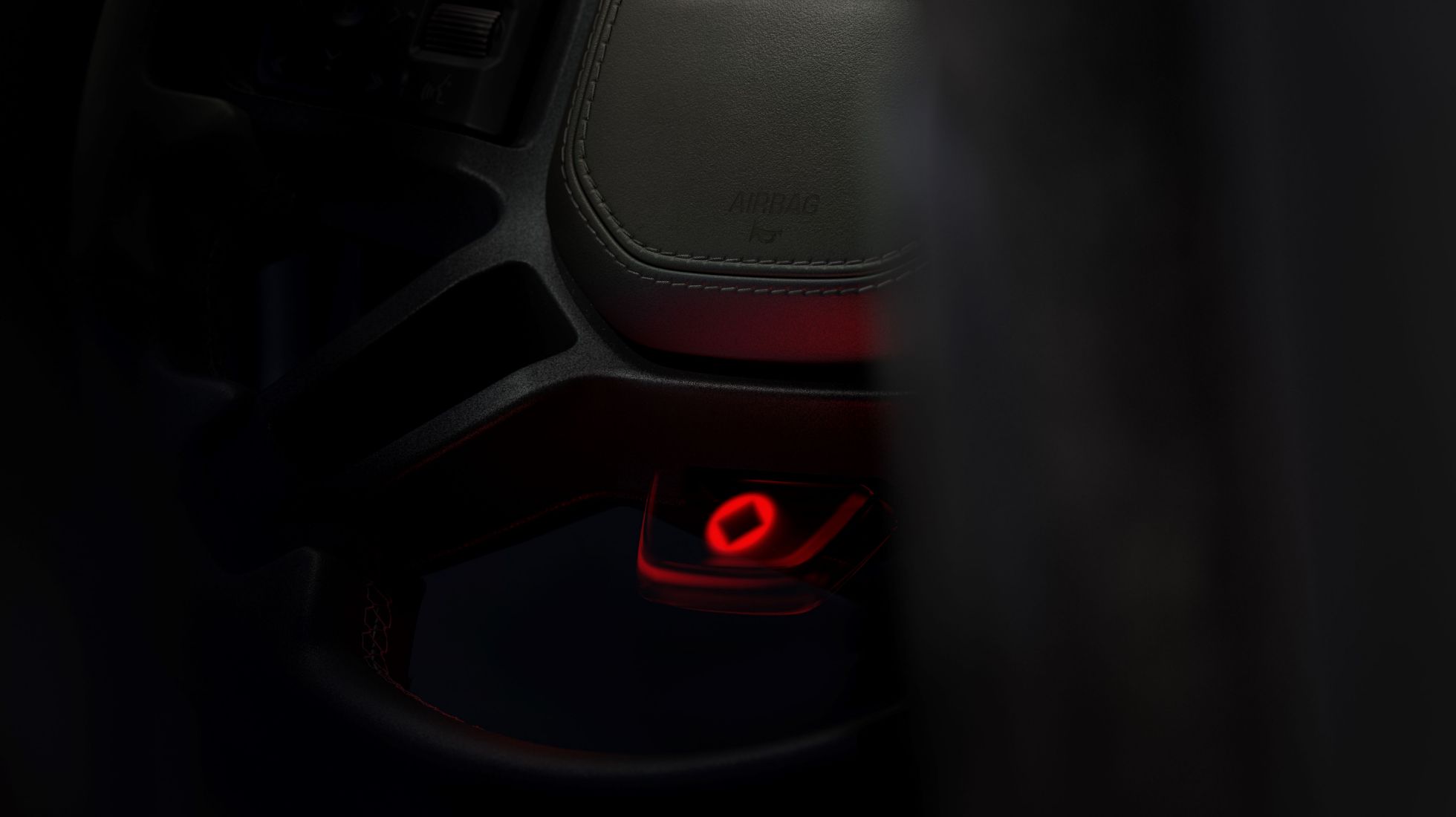 660bd29e52a4b8be8e8f950e_Land-Rover-Defender-Octa-TopGear-SA-Steering-wheel.jpg