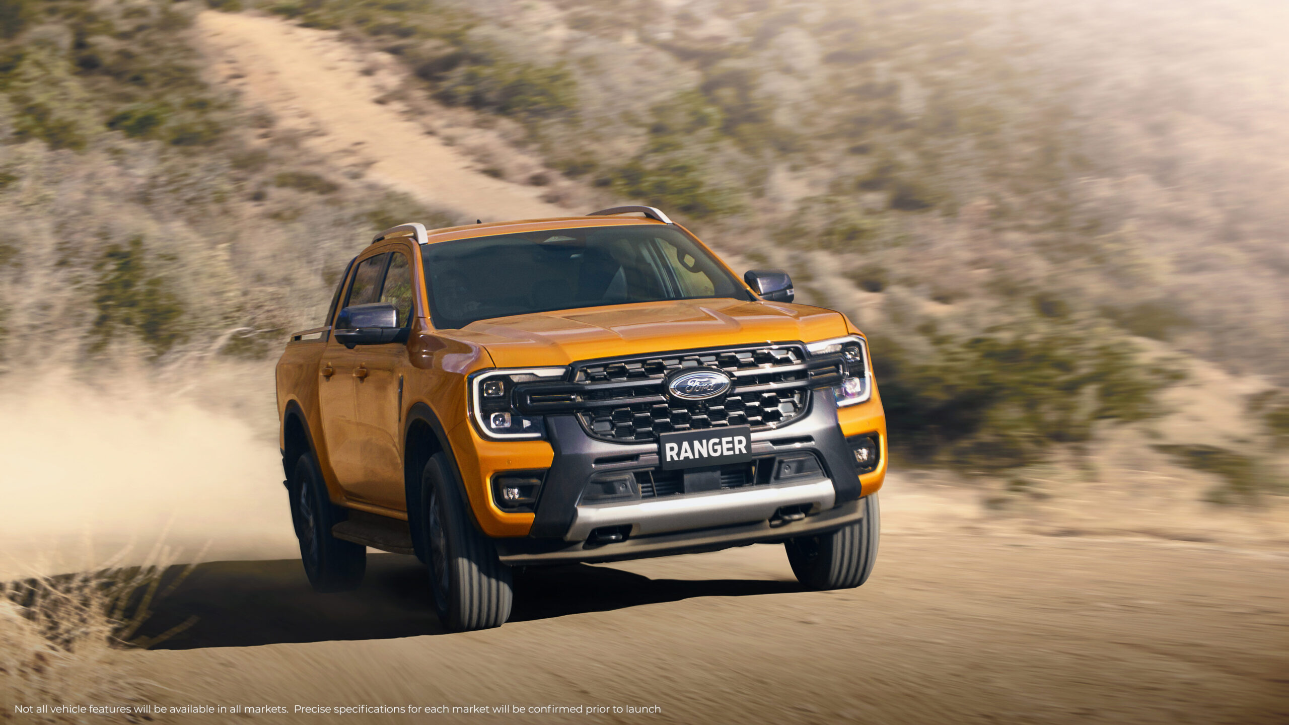 61e193cd245f6a85192ba9f6_NextGenFord-Ranger_Wildtrak_Front-3QTR_motionSmaller.jpg