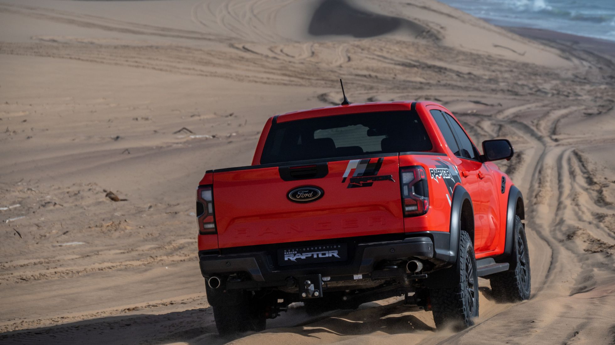 63eb32821812ab3b7d1b4720_Ford-Ranger-Raptor-TopGear-SA-Rear.jpg
