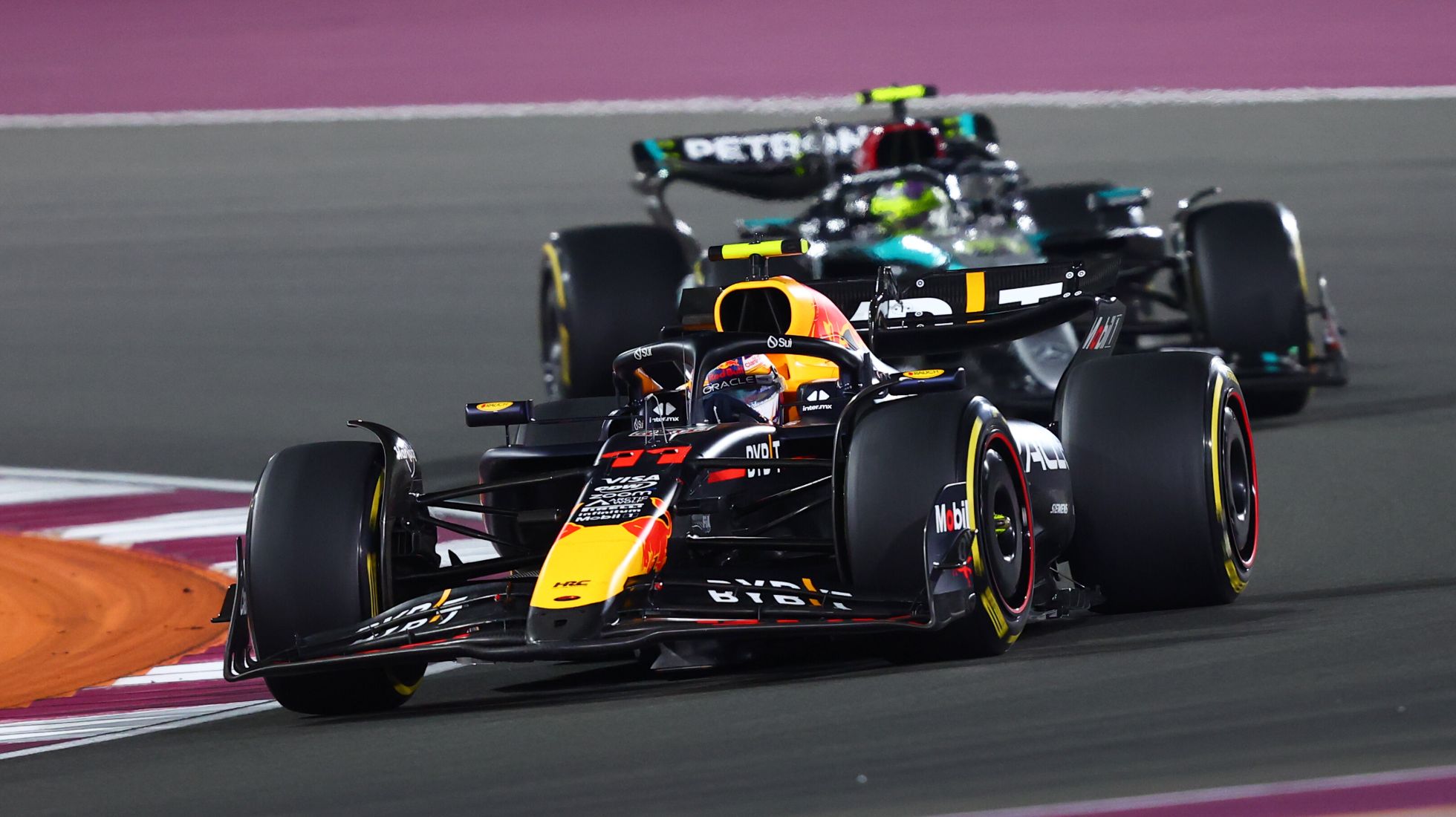 674db2fcce35bd62fab8fcc5_Qatar-GP-TopGearSA-REd-Bull-and-Merc.jpg